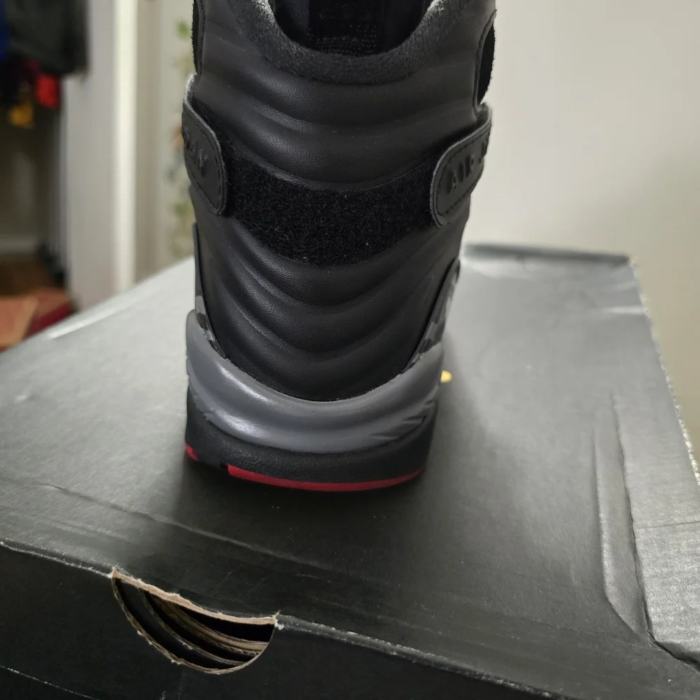 Jordan Black and Gray Sneakers with Cross-Straps...
